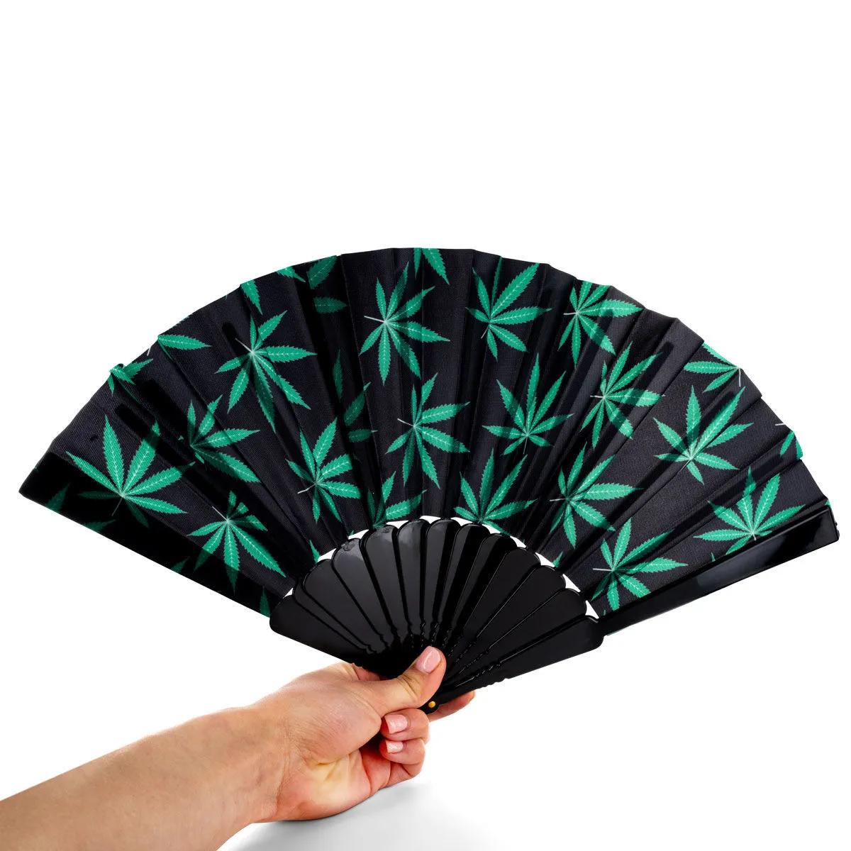 Hopfällbar solfjäder med cannabisblad